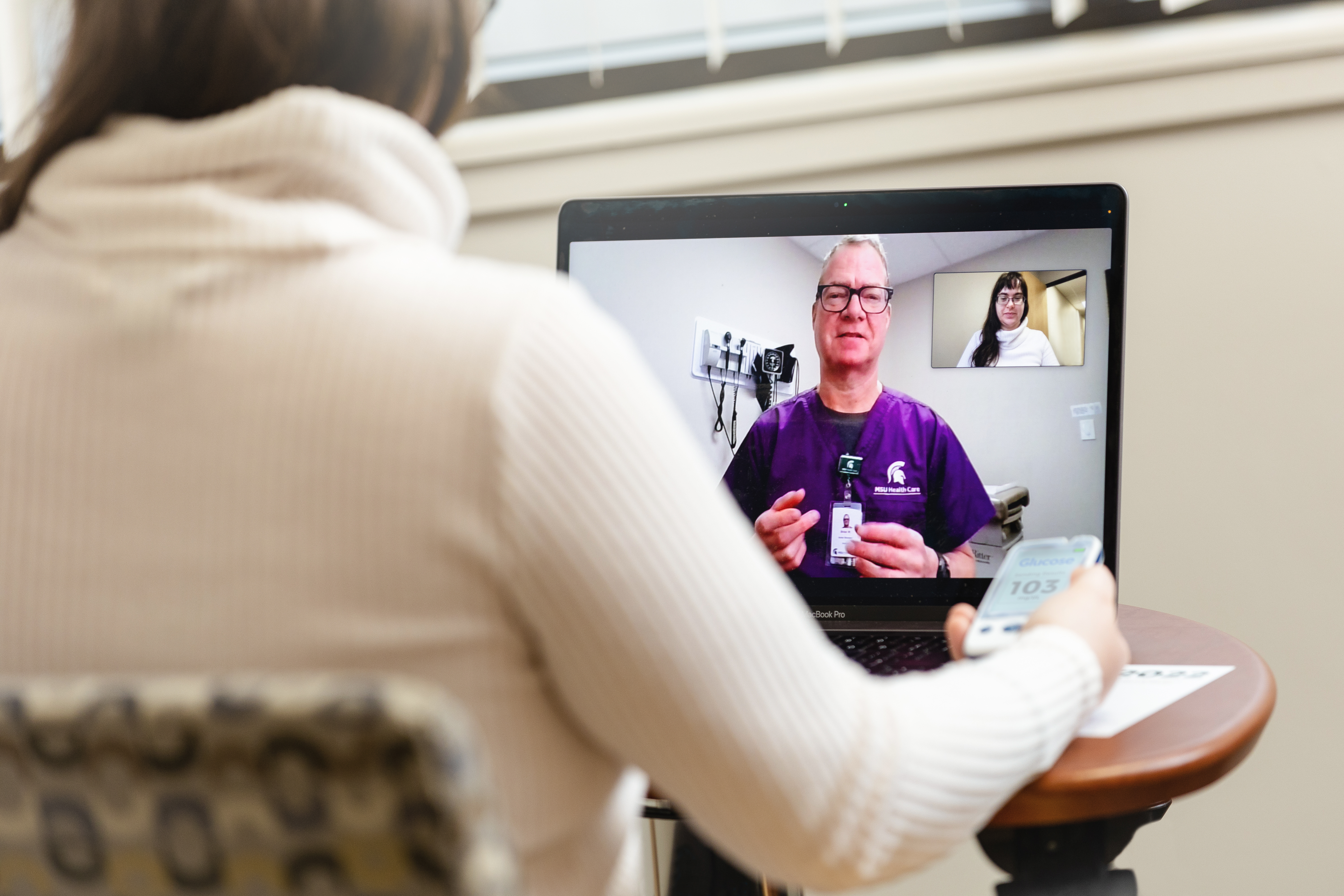 A patient is seen by their MSU Health Care provider during a virtual visit.